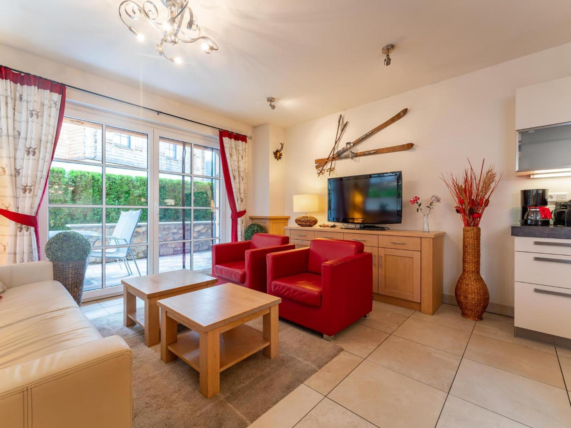 Arieke E10 Apartment คาพรูน ภายนอก รูปภาพ