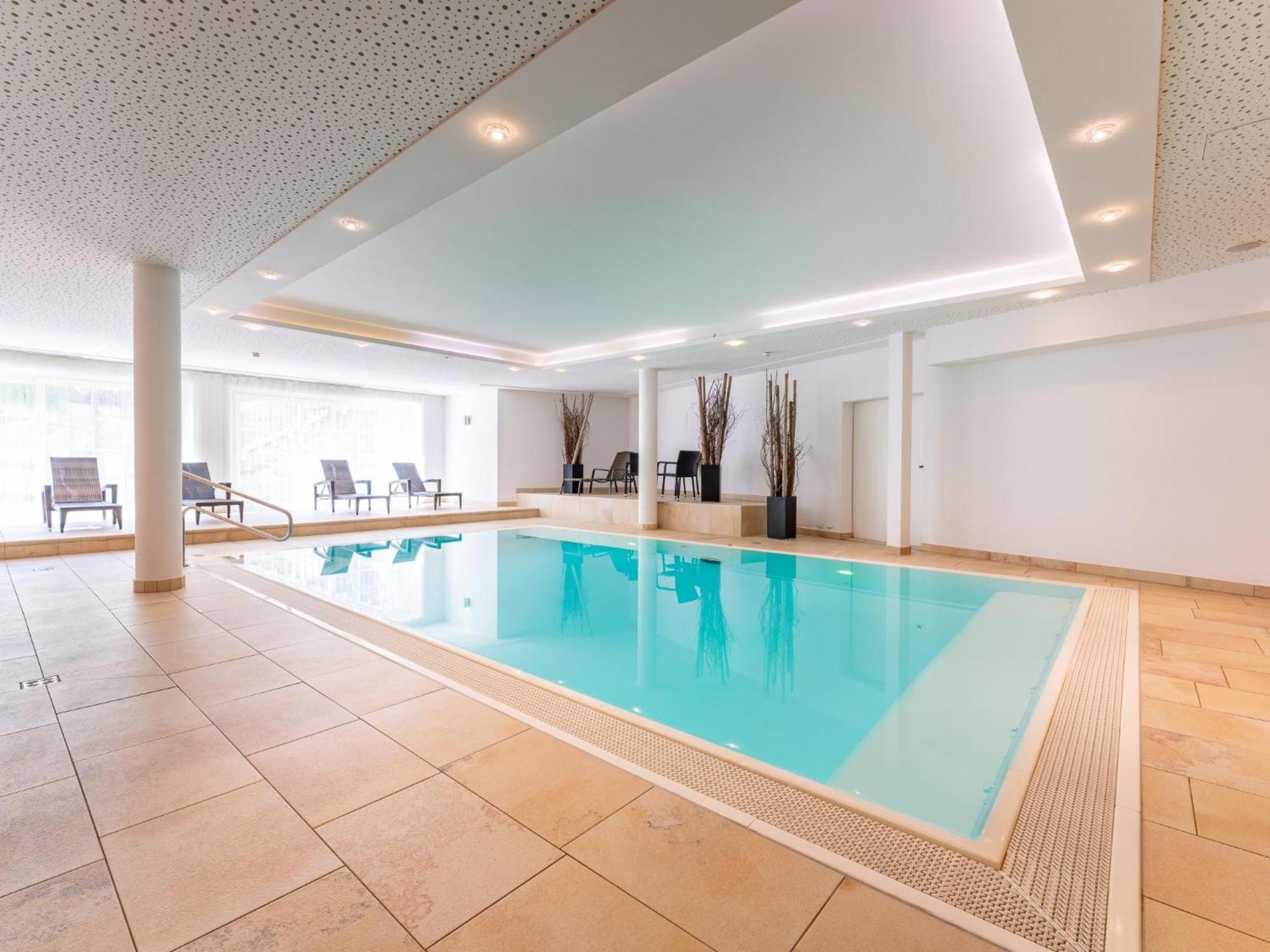 Arieke E10 Apartment คาพรูน ภายนอก รูปภาพ